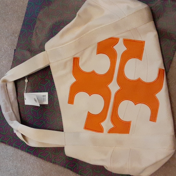 Tory Burch Handbags - NWT! Tory Burch cream & orange Beach Logo Canvas Tote w/ partial leather handles
